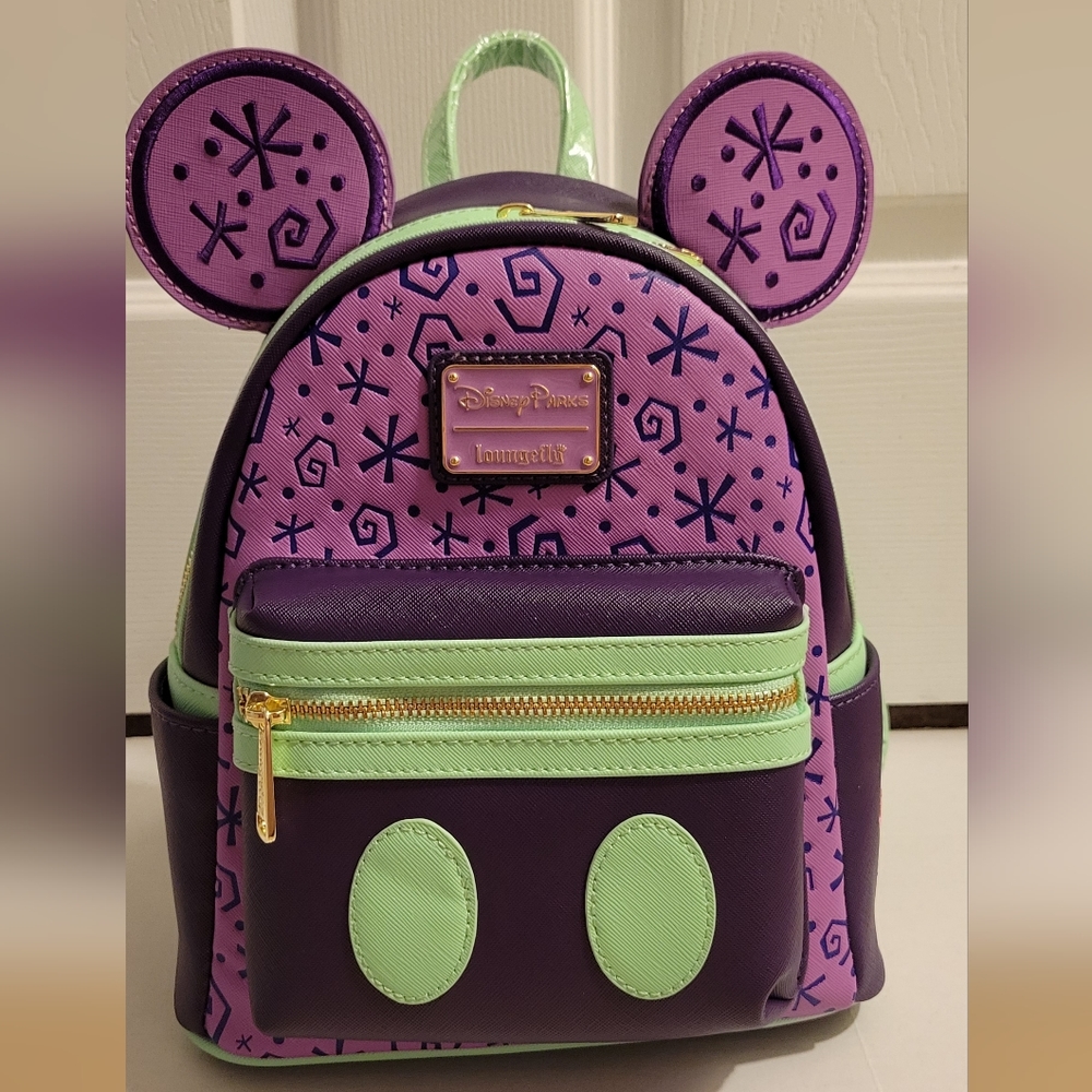 Disney Loungefly MMMA Mad Tea Party backpack